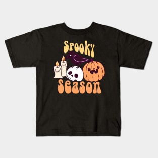 Spooky season a cute crow on a skull with a pumpkin and candles Kids T-Shirt